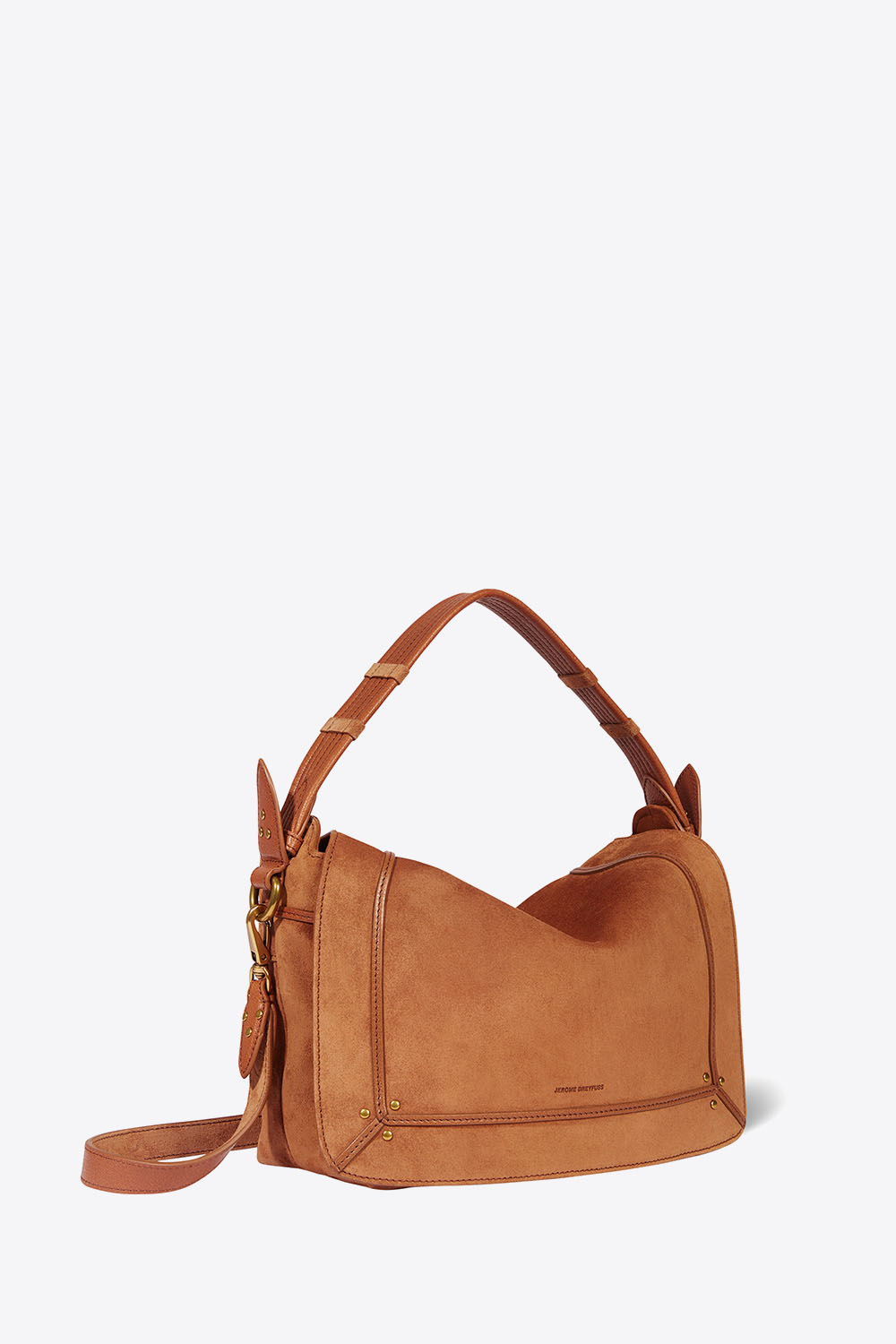 Produit Sac Pepito M en cuir suédé caramel Jérôme Dreyfuss. Profil. Détail de la anses porté main.