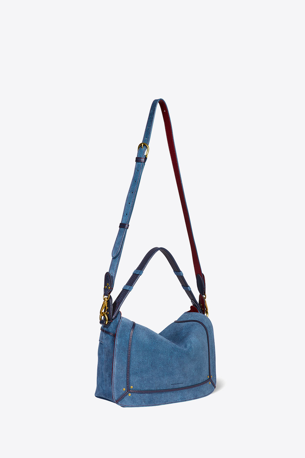 Produit Sac Pepito M en cuir suédé effet jean Jérôme Dreyfuss. Profil. Détail de la bandoulière.
