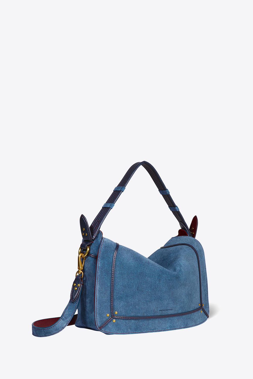 Produit Sac Pepito M en cuir suédé effet jean Jérôme Dreyfuss. Profil. Détail de la anse porté main.