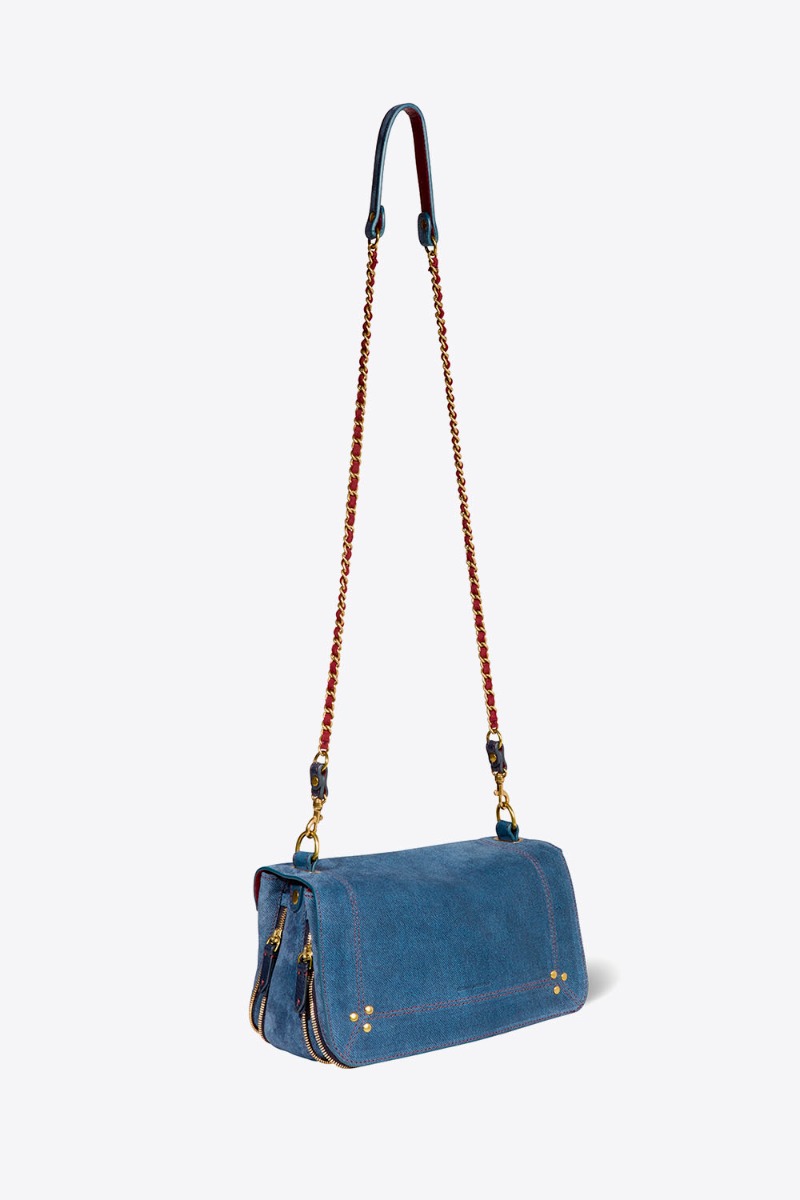 Produit Sac Bobi Jérôme Dreyfuss en cuir suédé jeans. Vue de profil avec bandoulière longue.