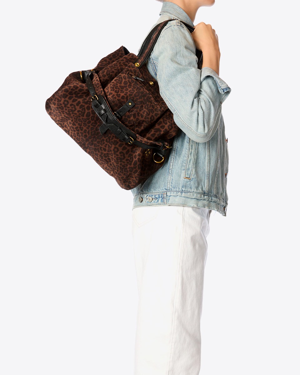 Sac cabas Billy M Jérôme Dreyfuss en cuir imprimé léopard naturel porté à l'épaule.