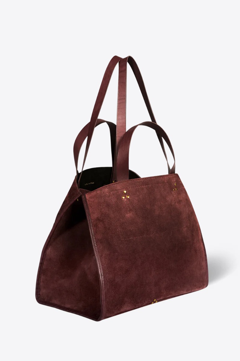 Sac cabas L&eacute;on M J&eacute;r&ocirc;me Dreyfuss en cuir su&eacute;d&eacute; br&ucirc;l&eacute;. Vue de profil. D&eacute;tail des quatre anses. Deux courtes et deux longues.