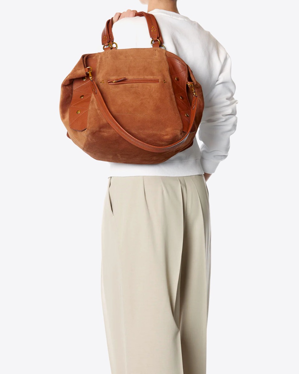Sac cabas Roger Jérôme Dreyfuss en cuir suédé caramel porté main.