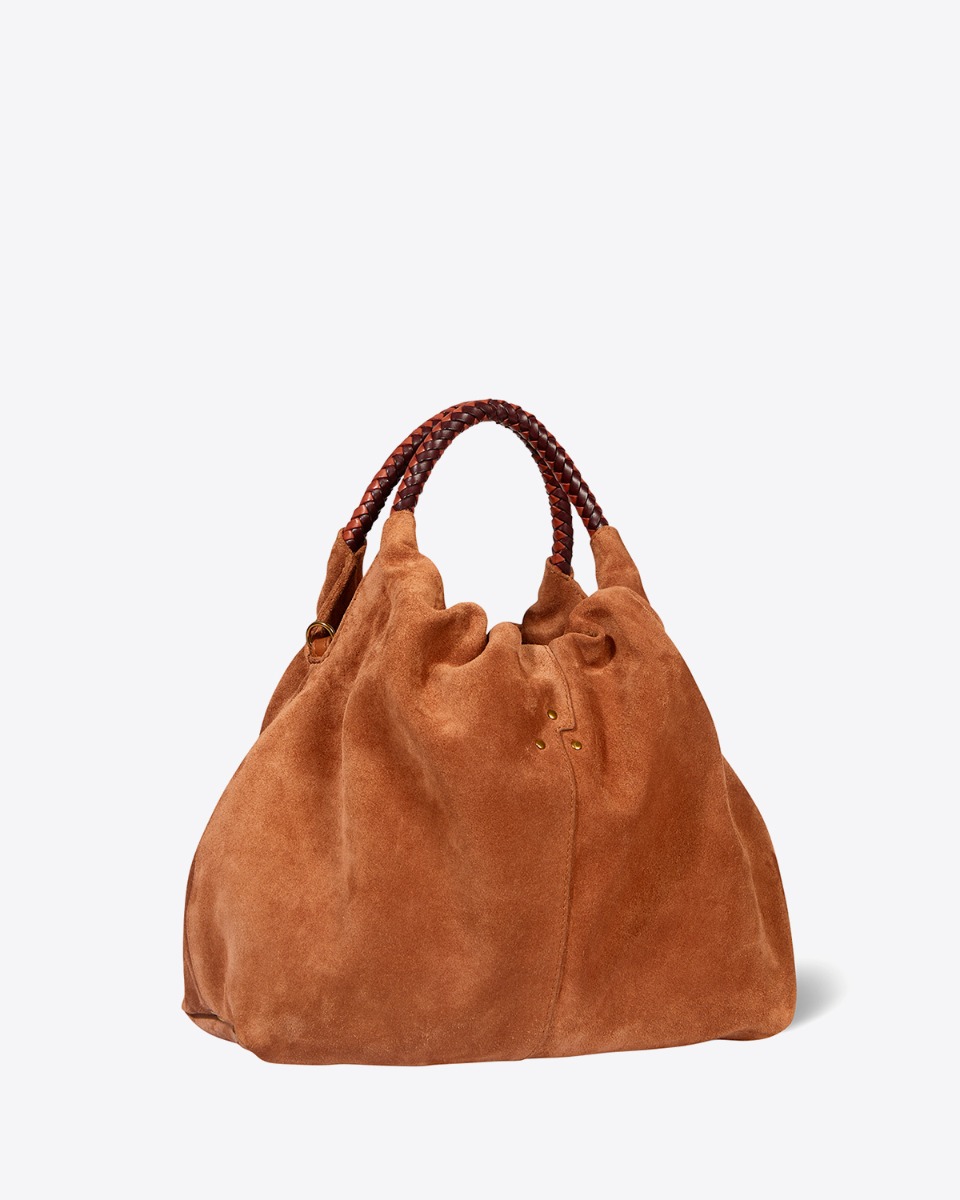 Produit Sac Gordi M Jérôme Dreyfuss en cuir suédé caramel. Anses rondes en cuir tressé et bandoulière longue amovible. Porté main, épaule ou croisé. Profil.