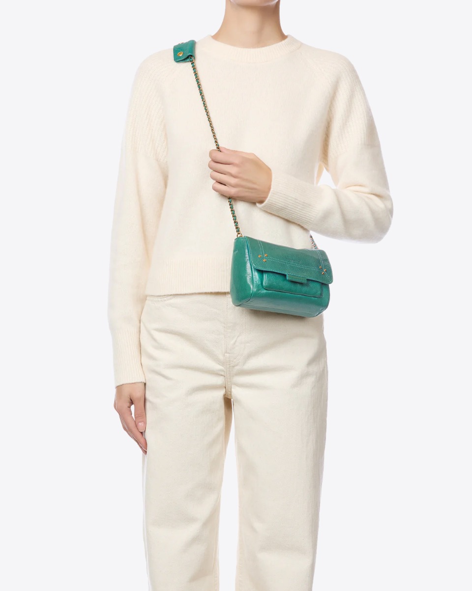 Sac Lulu S J&eacute;r&ocirc;me Dreyfuss en cuir turquoise, port&eacute; crois&eacute;.