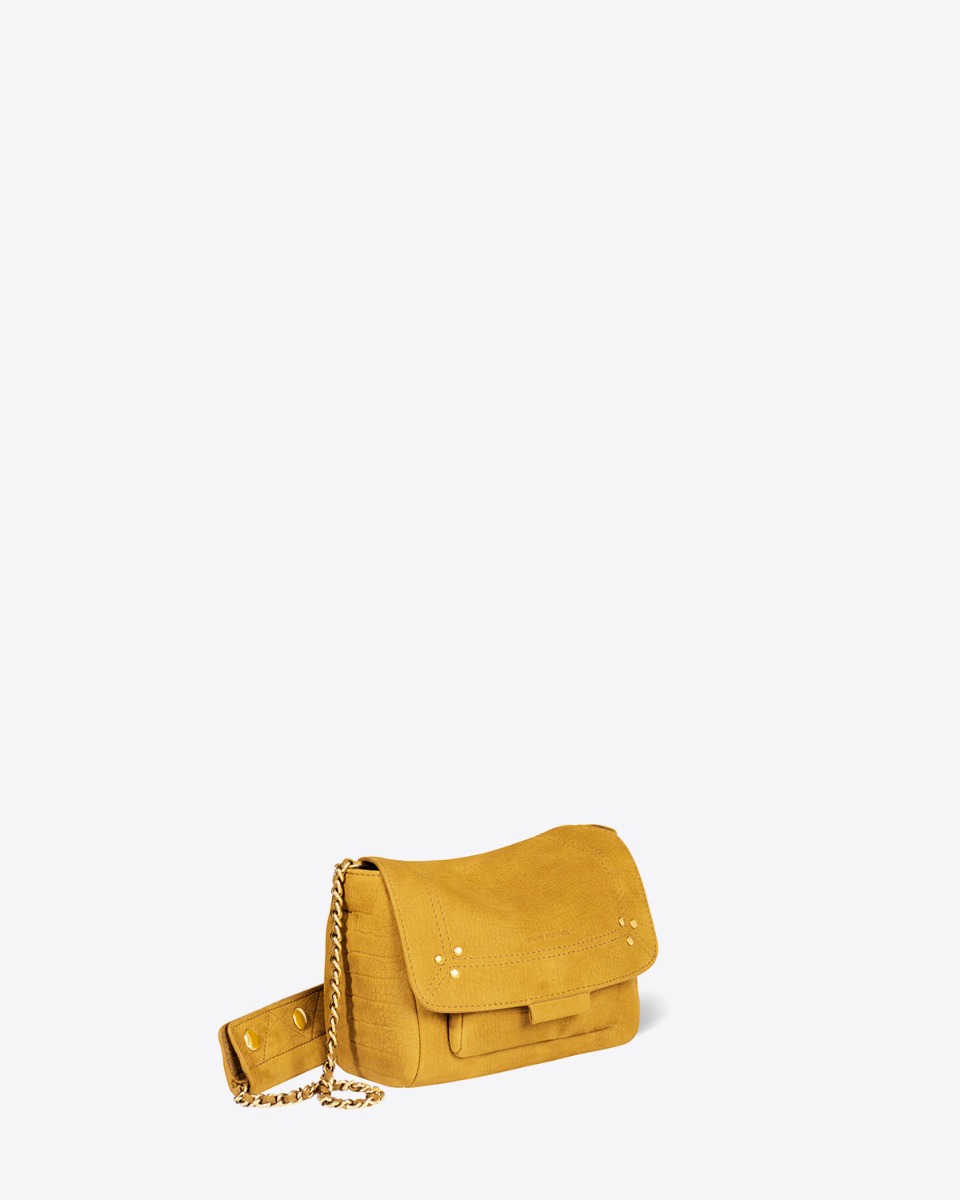 Sac Lulu S Jérôme Dreyfuss en cuir de taurillon imprimé croco moutarde. Vue de profil.