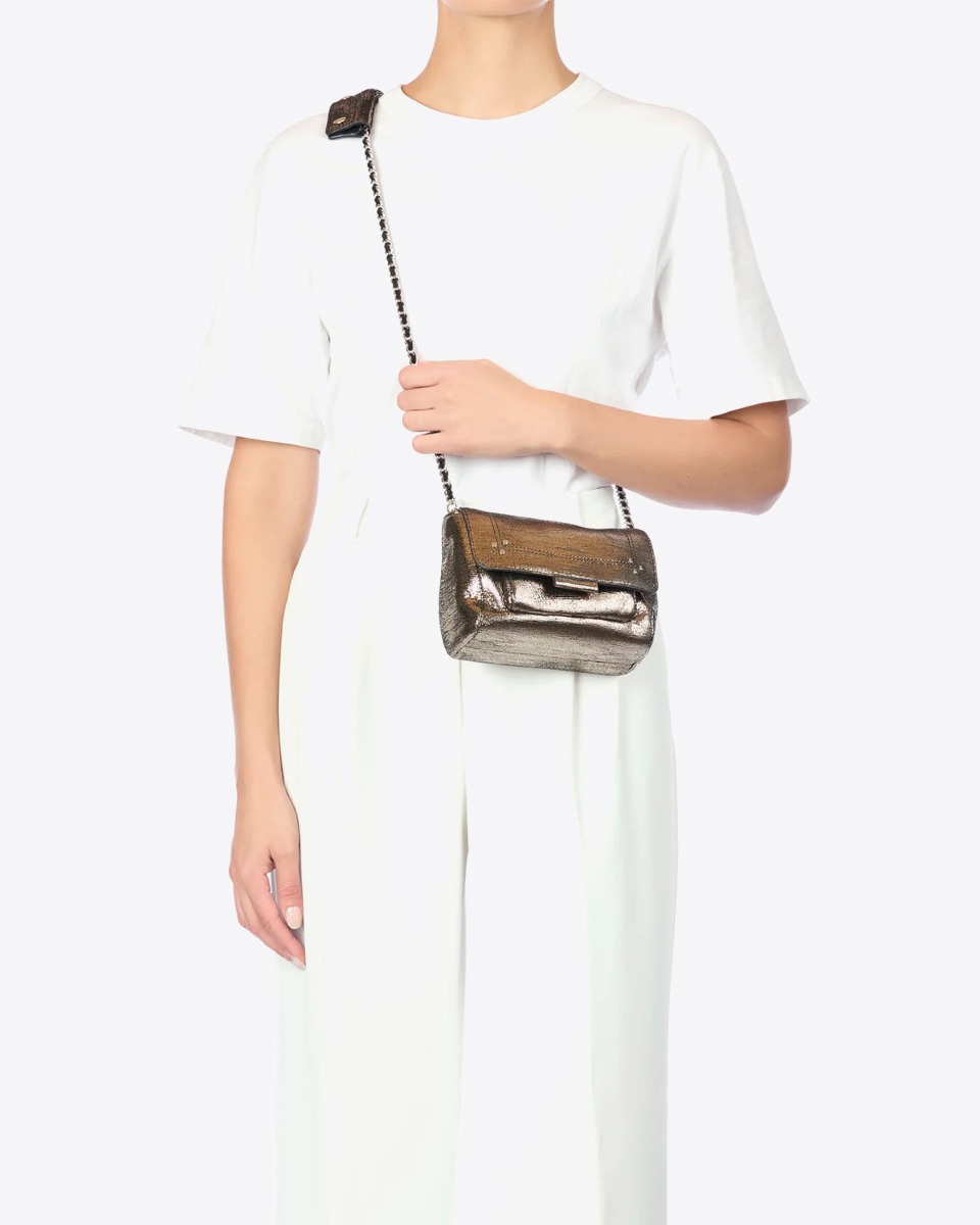 Sac Lulu S Jérôme Dreyfuss en cuir de chèvre lamé champagne porté croisé.