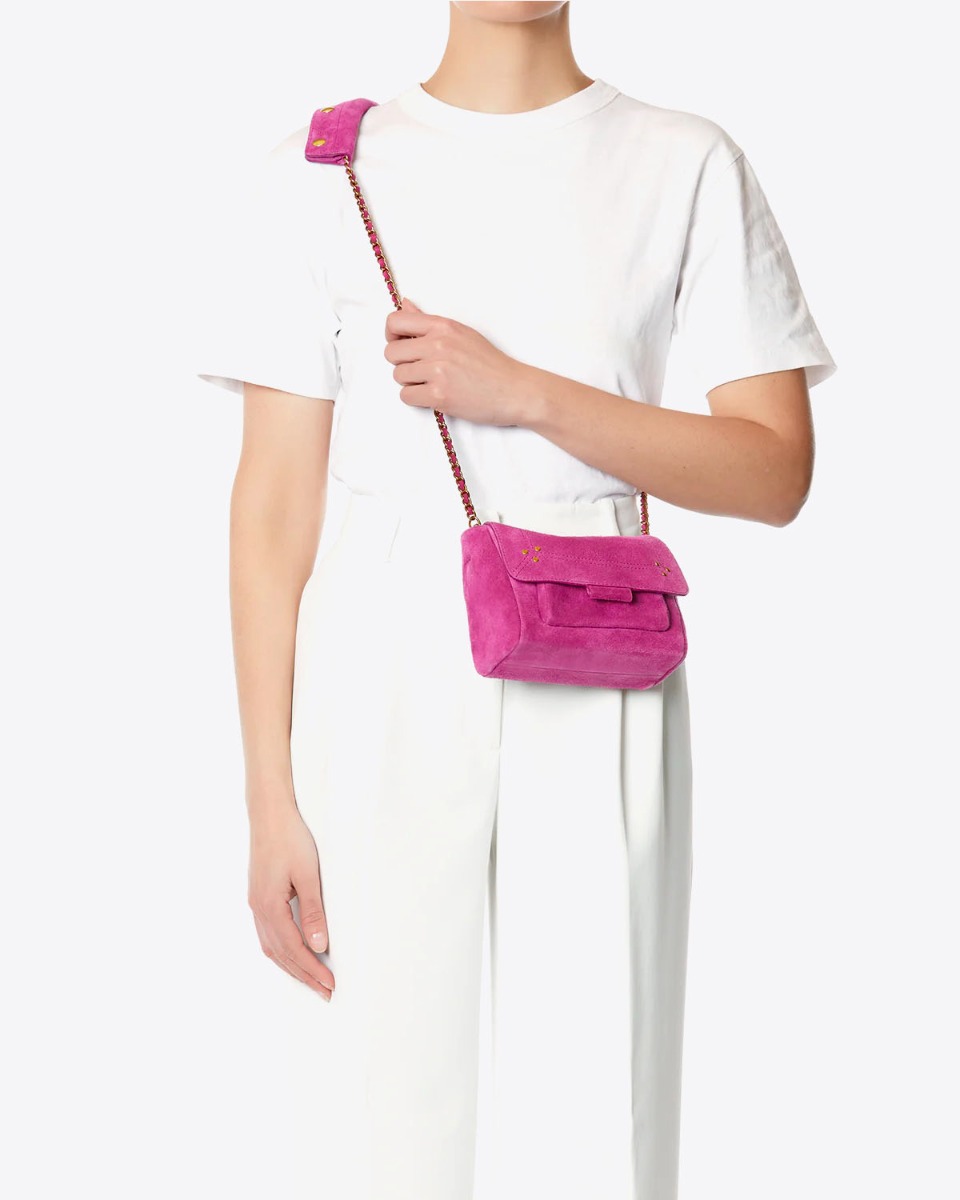 Sac Lulu S Jérôme Dreyfuss en cuir suédé rose orchidée porté croisé.