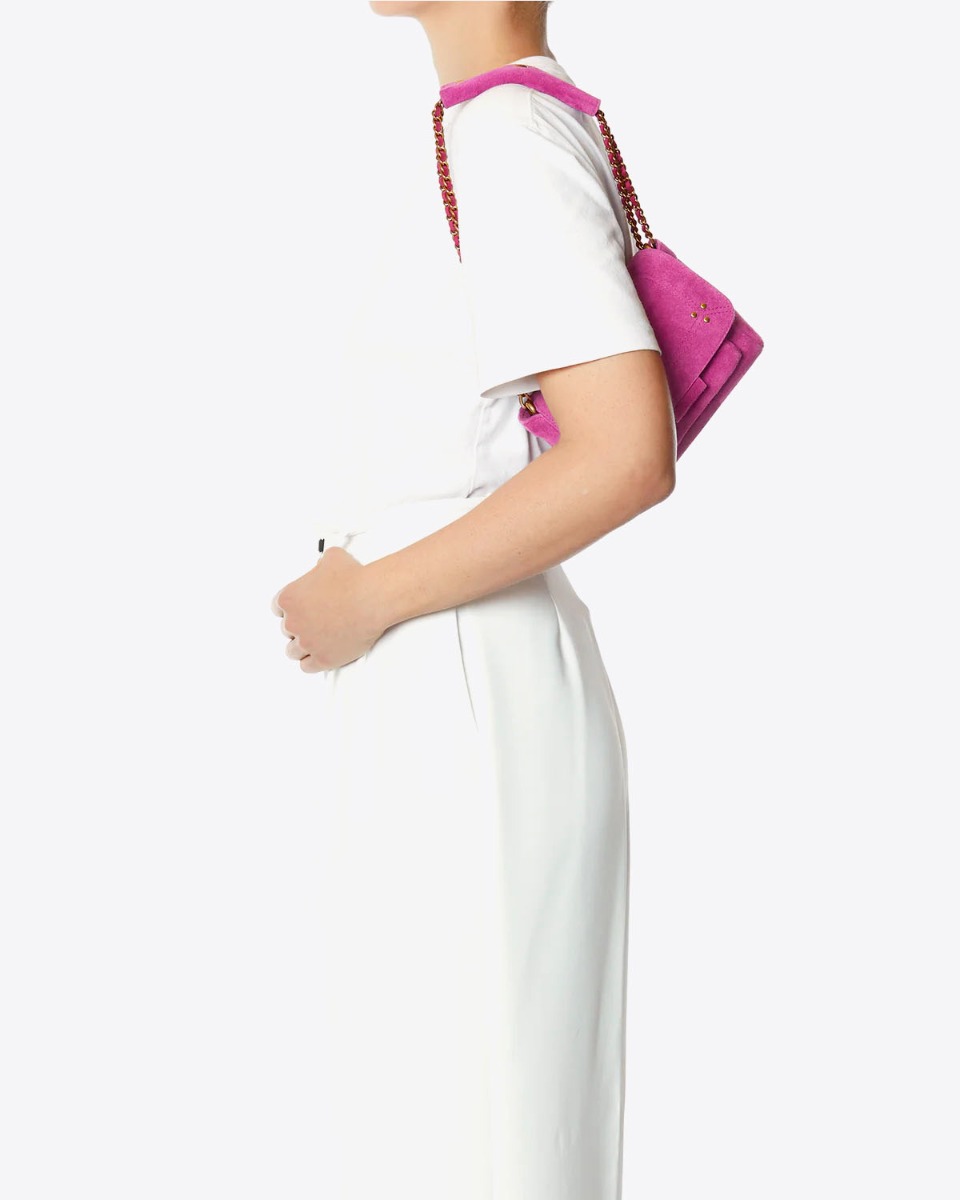 Sac Lulu S Jérôme Dreyfuss en cuir suédé rose orchidée. Porté court sur l'épaule.