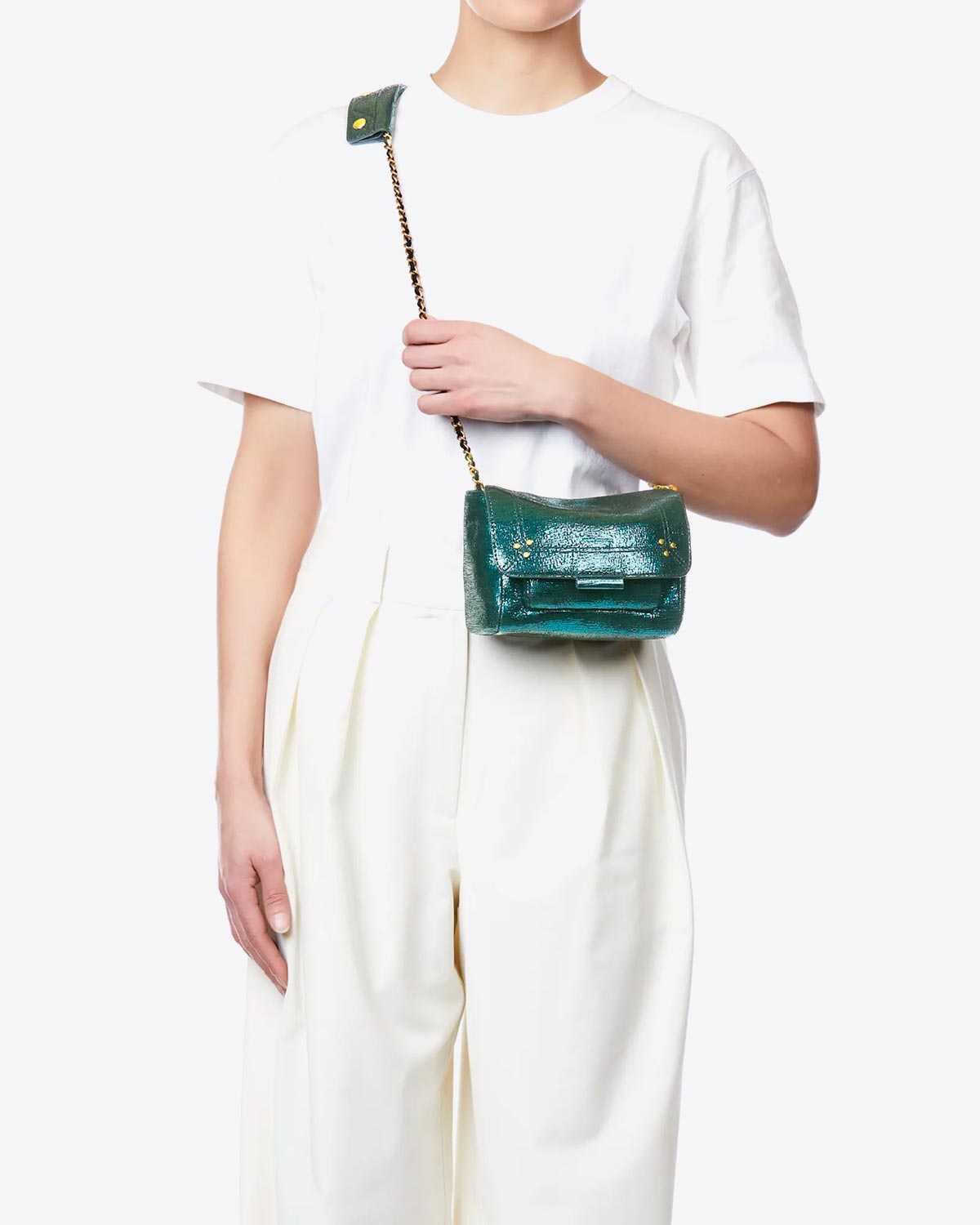 Petit Sac Lulu S Jérôme Dreyfuss en cuir lamé vert. Porté en crossbody. 