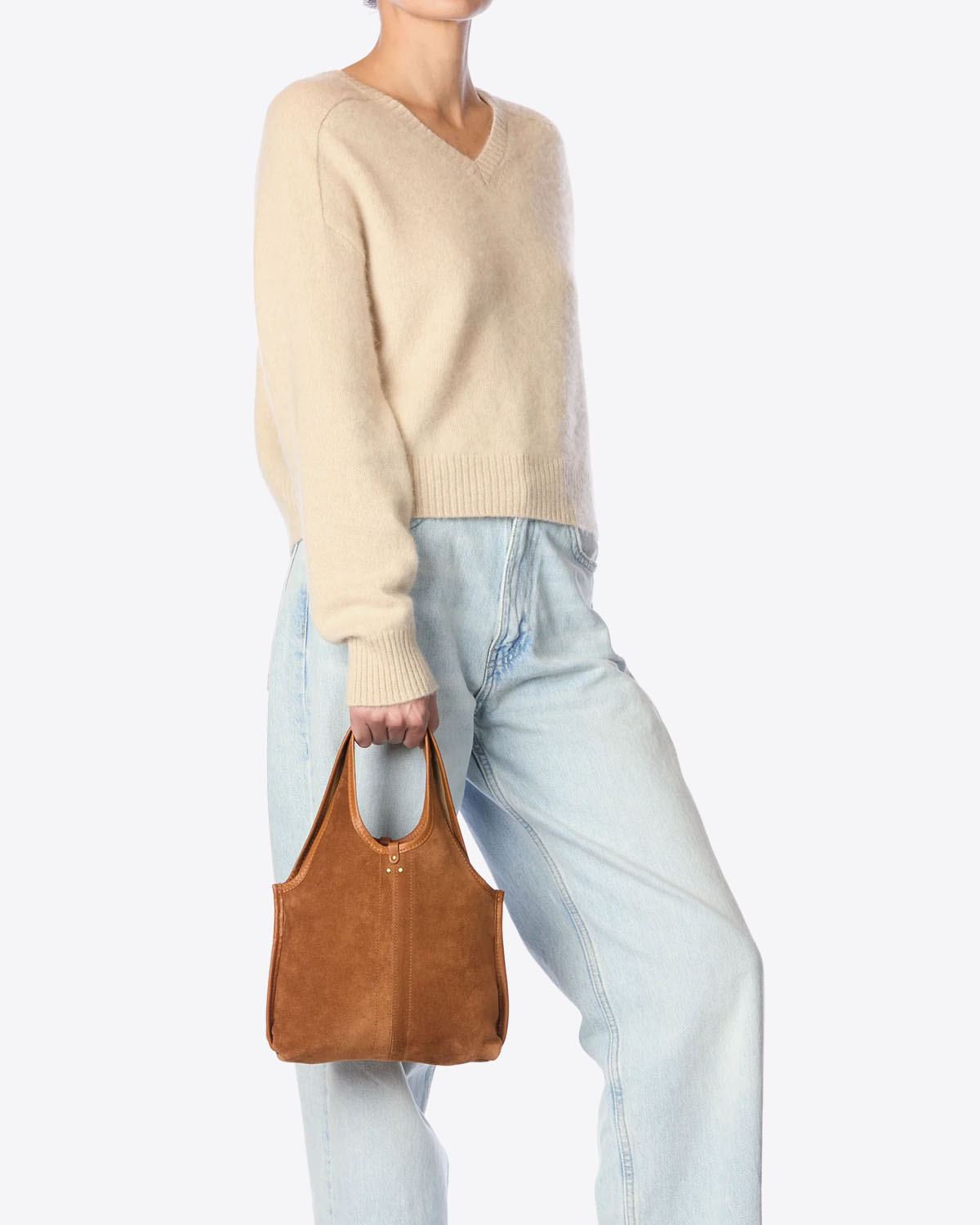 Sac petit cabas souple Paco S Jérôme Dreyfuss en cuir suédé marron. Vue porté main. 