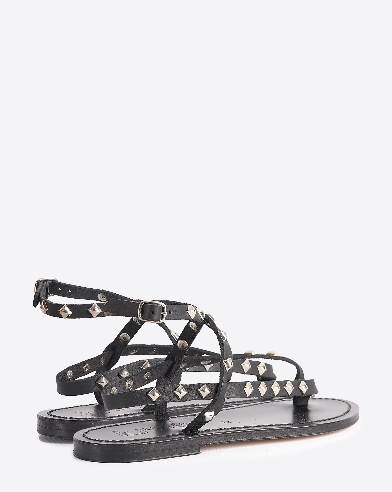 Sandales plates Deltapyr en cuir noir avec clous K.Jacques. Dos. 