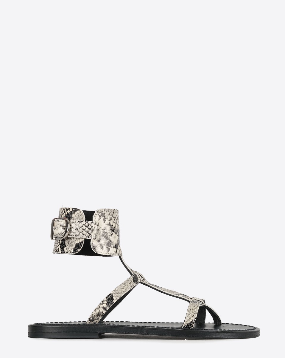 Sandales plates Caravelle K.Jacques St-Tropez en cuir effet python Kampal Duna. Vue de profil.