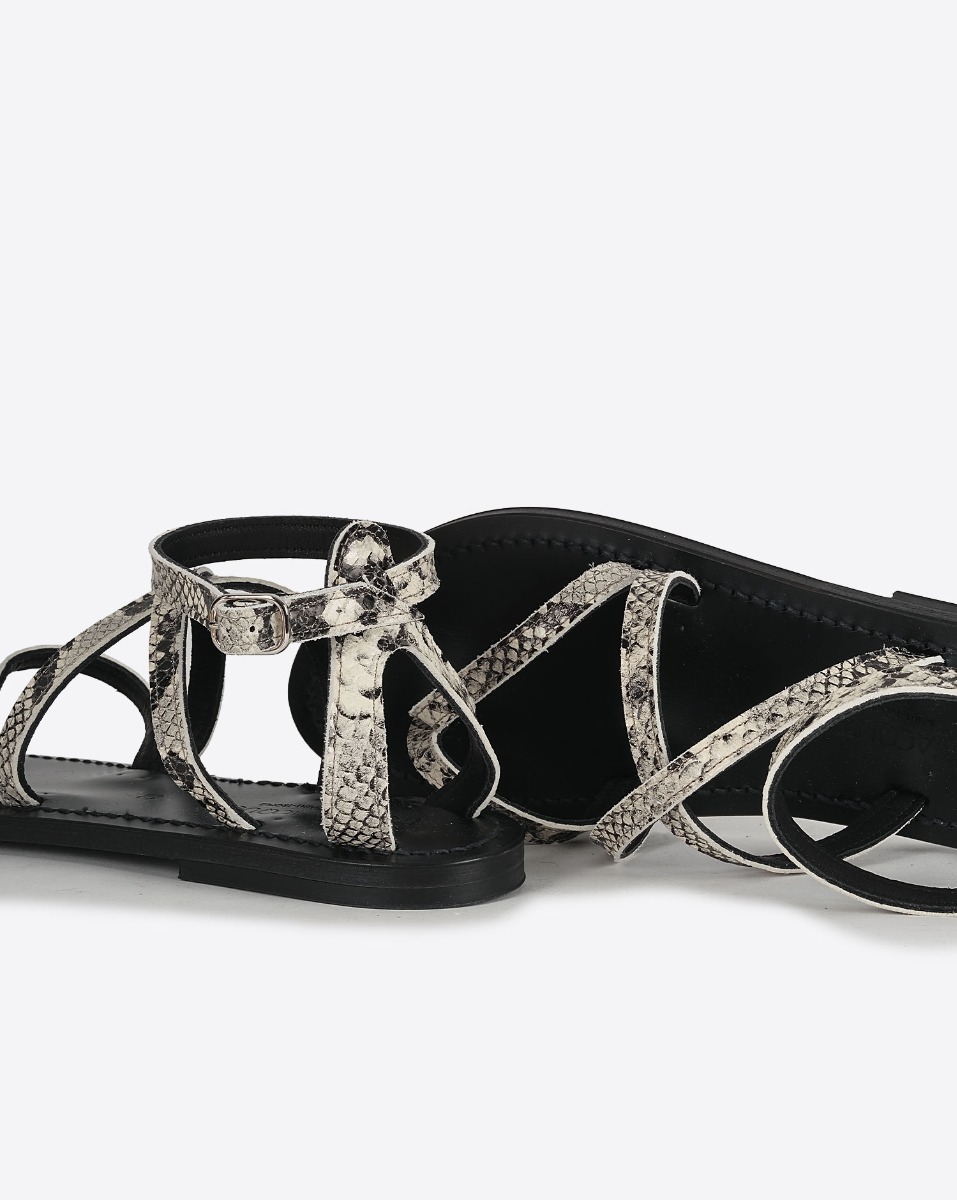 Sandales plates K.Jacques St-Tropez en cuir effet python Kampal Duna. D&eacute;tail des semelles en cuir noir.