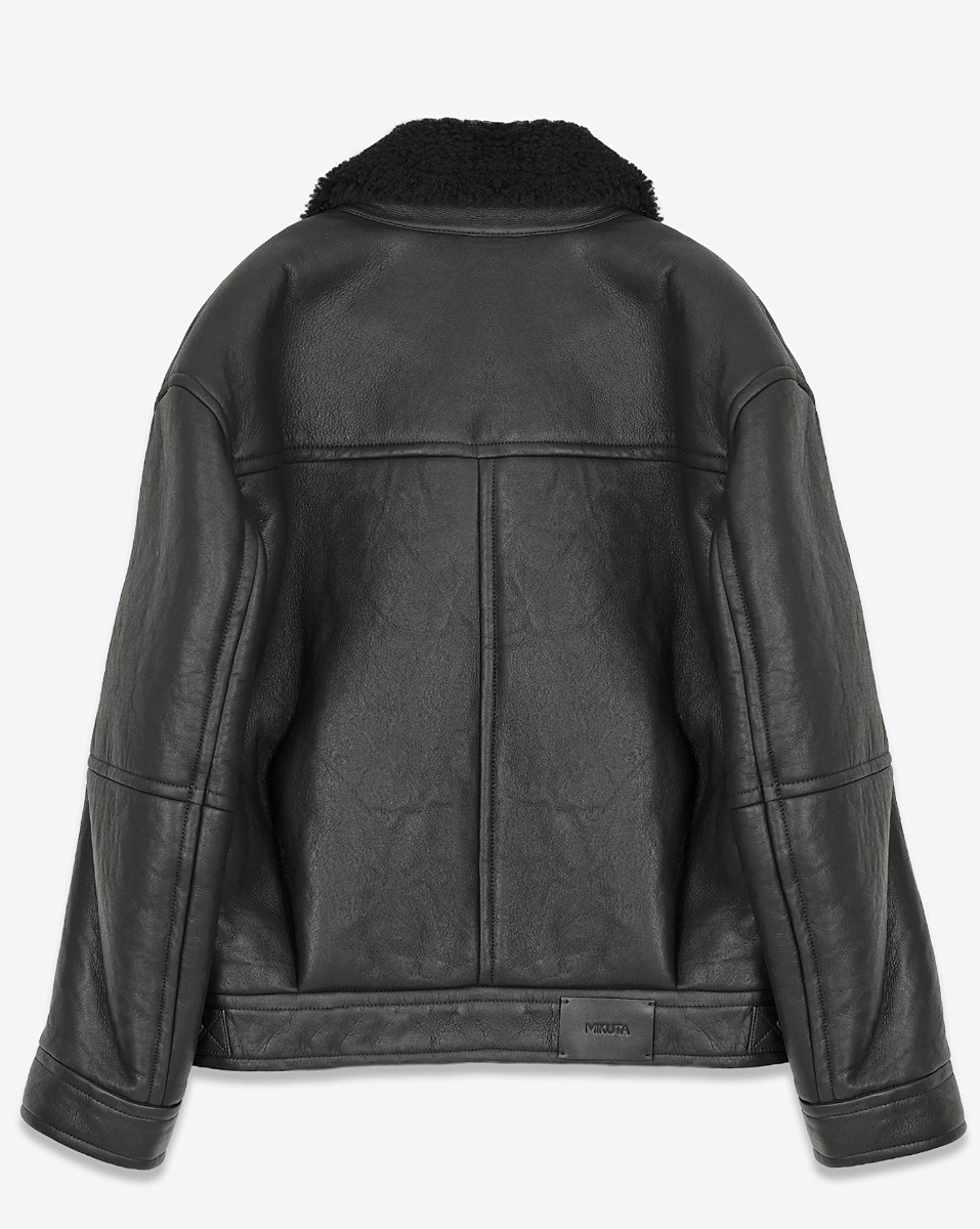 Blouson bombardier Mikuta en cuir et peau de mouton noir ultra-chaude. Vue de dos.