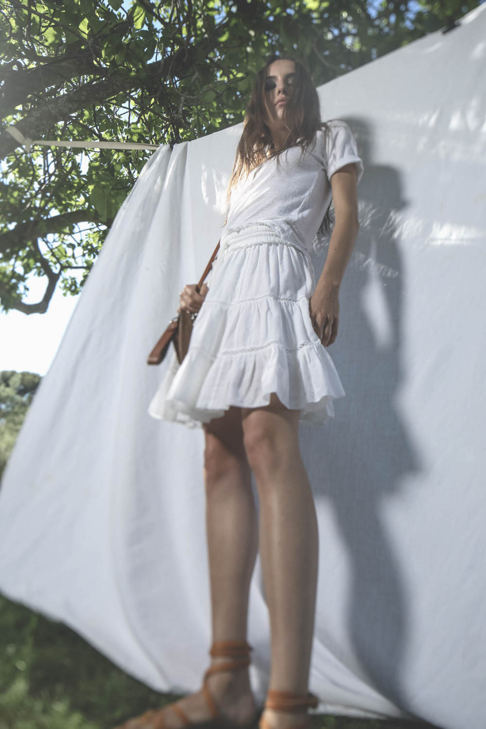 Jupe au dessus du genoux à volants en coton blanc Lioline Marant Etoile. 