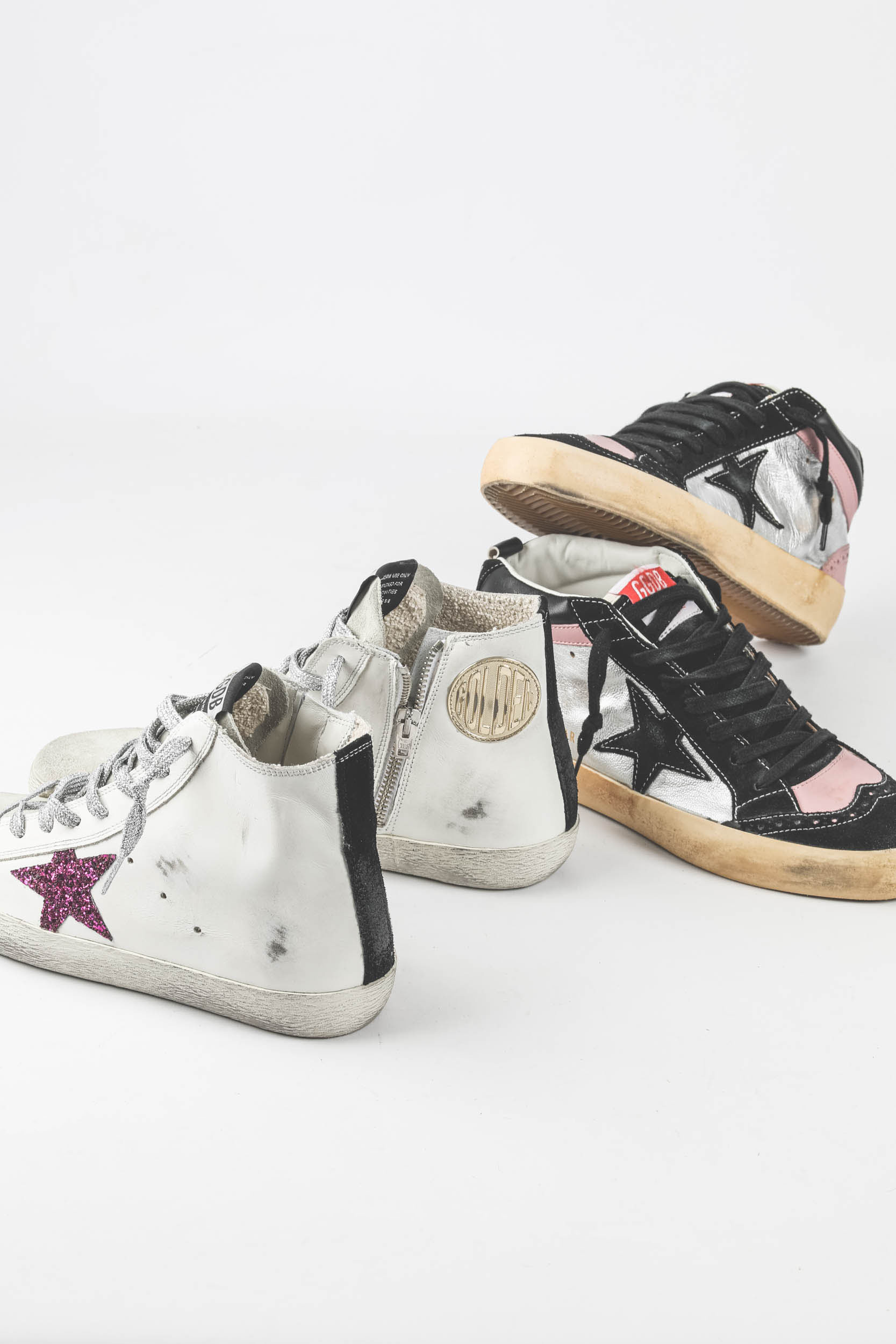 Baskets Midstar en cuir argent étoile en cuir noir Golden Goose. 