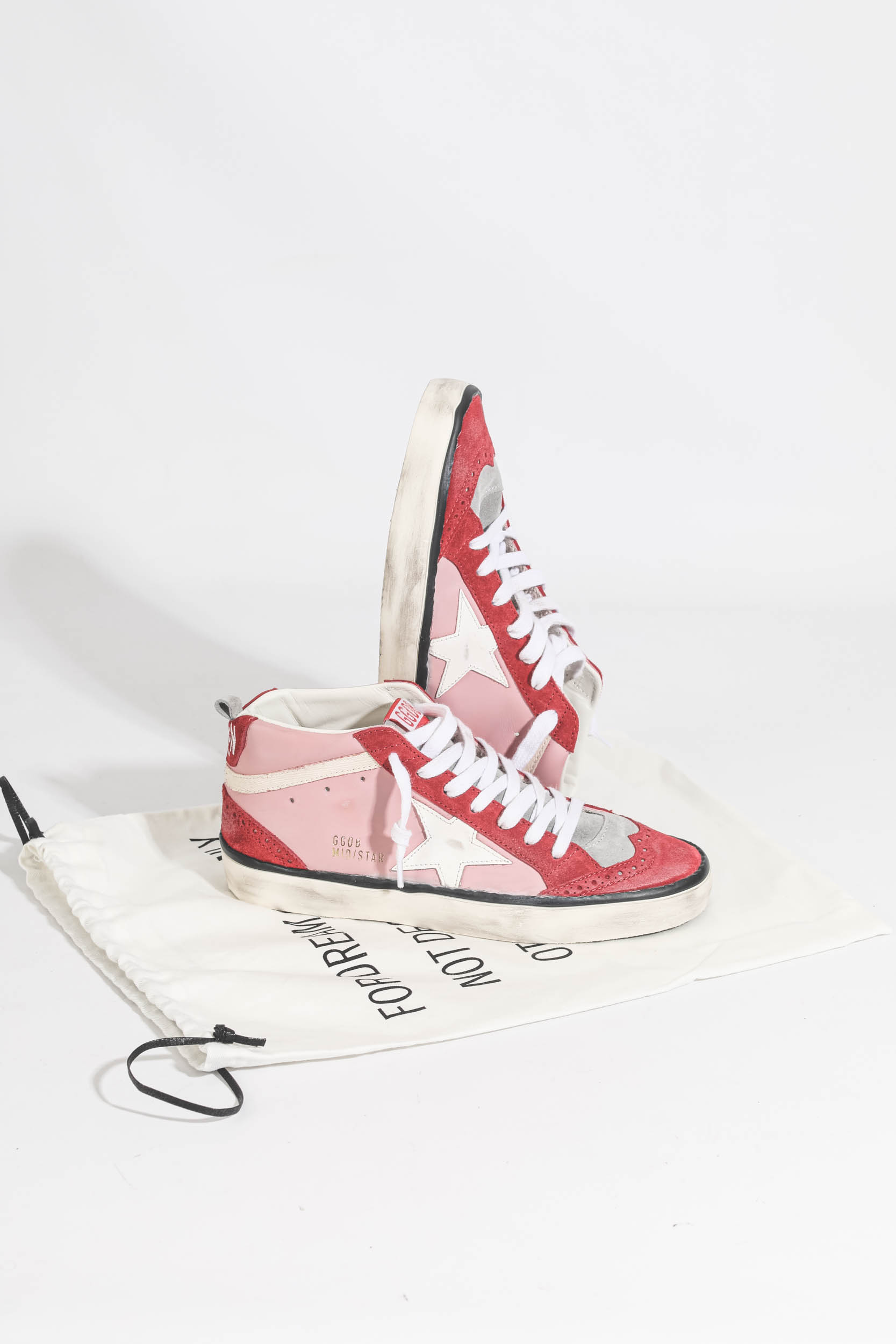 Baskets Mid Star en cuir rose étoile en cuir blanc Golden Goose.