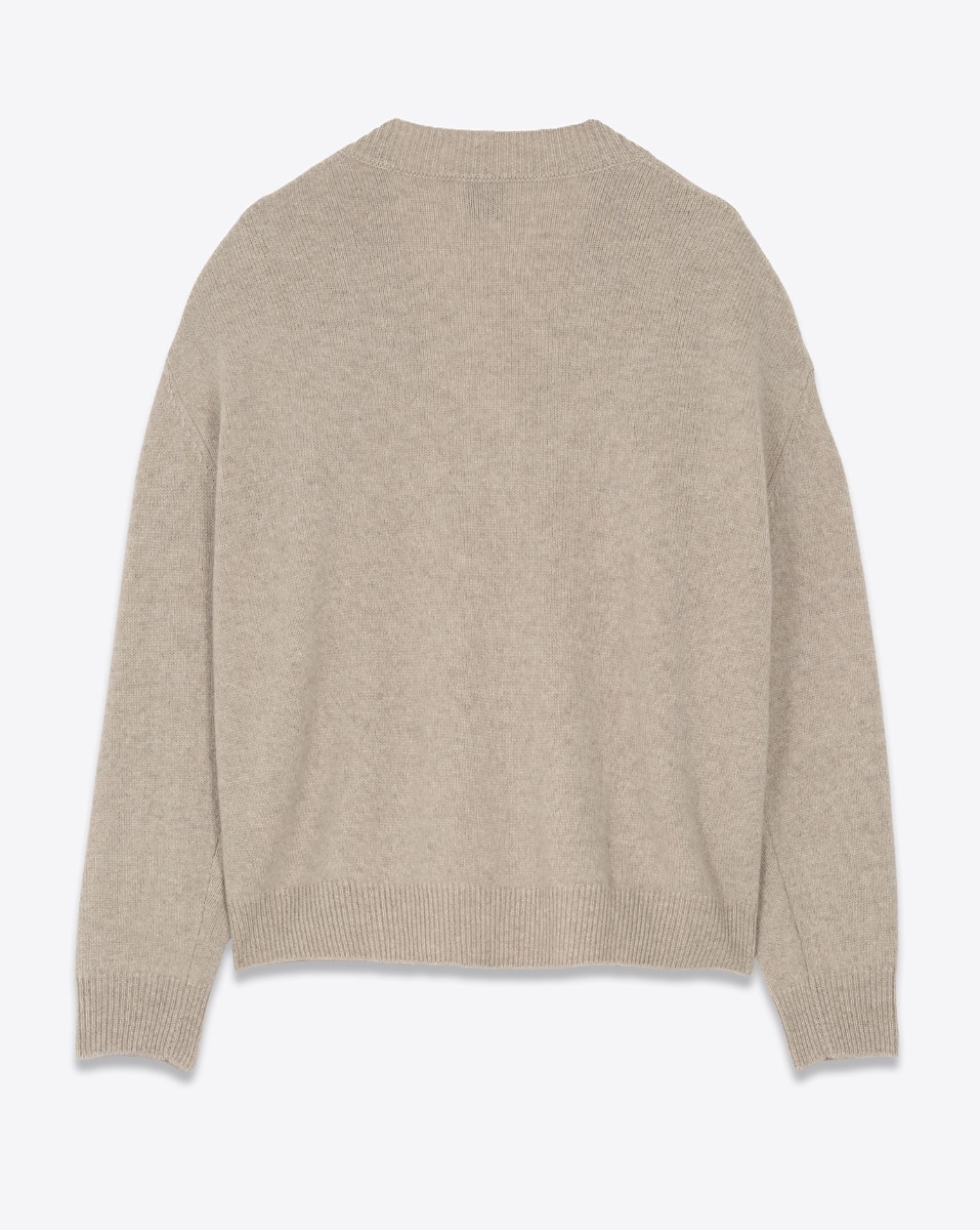 Pull col V Lee Anine Bing en cachemire beige. Vue de dos.