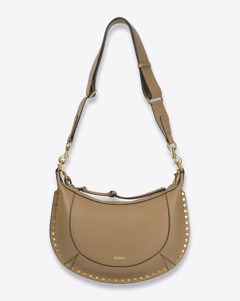 Sac Naoko Isabel Marant en cuir grainé kaki. Anse courte porté main et bandoulière longue réglable porté épaule ou croisé. Face. Détail de la bandoulière.