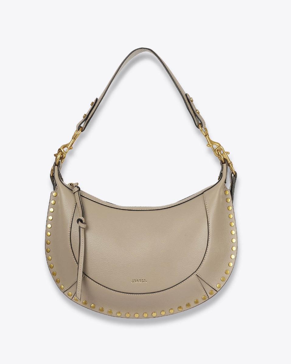 Produit Sac Naoko Isabel Marant en cuir grainé taupe. Anse courte et bandoulière longue amovible et réglable. Porté épaule et main ou épaule et croisé. Face. Anse courte.