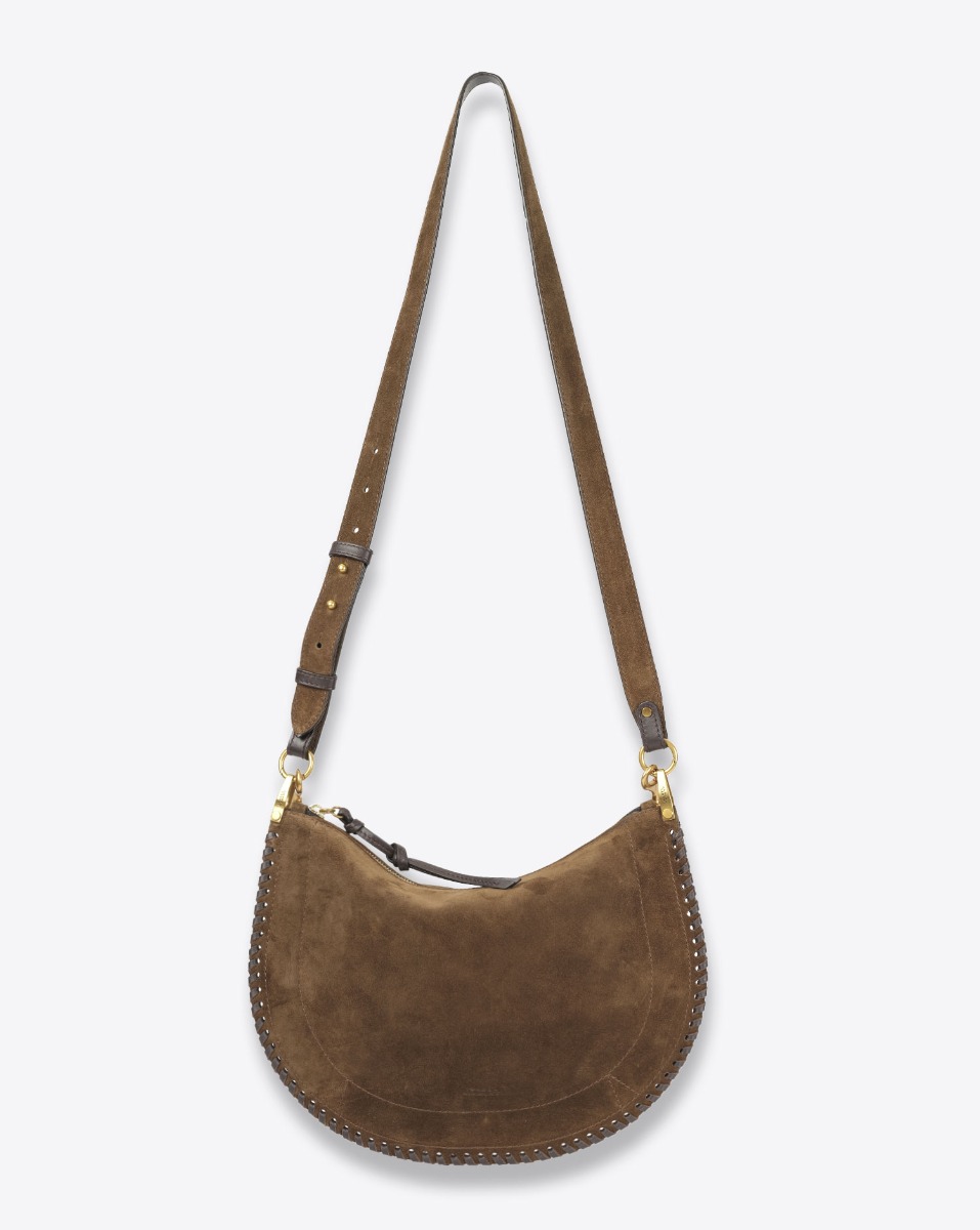 Produit Sac Oskan Soft zip Isabel Marant en cuir suédé bronze et tressé. Anse en cuir porté main ou épaule et bandoulière en cuir amovible et réglable pour un porté épaule ou croisé. Détail de la anse. Face. Bandoulière longue. 