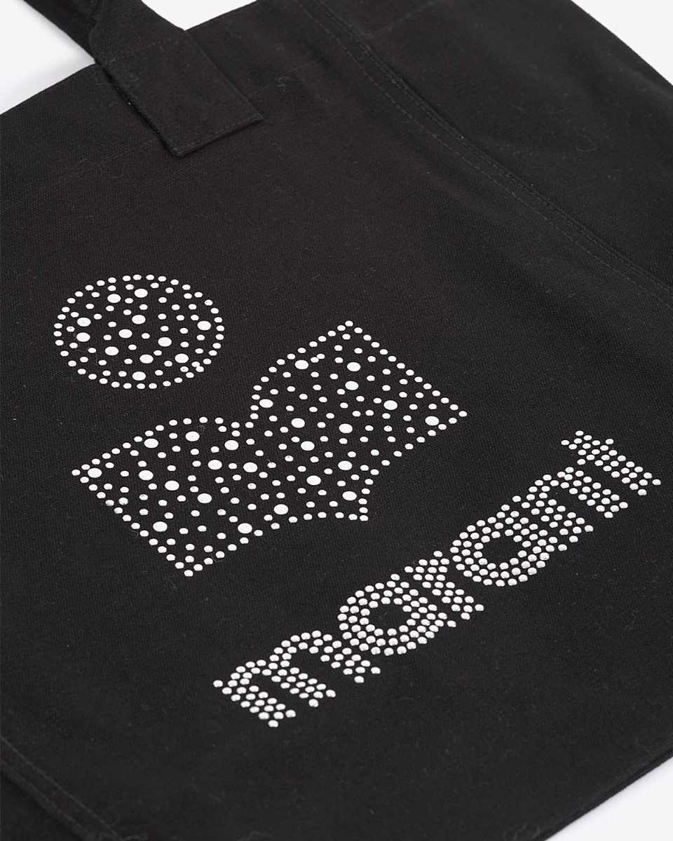 Sac cabas en toile de coton noir, logo clouté argenté Yenky Isabel Marant. Détail du logo clouté argenté Marant.