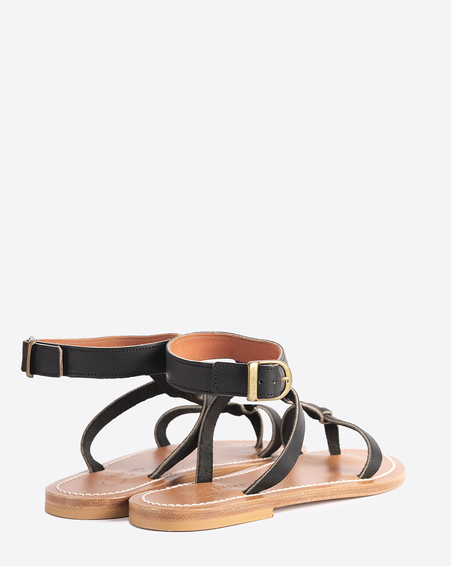 Sandales plates Artimon K.Jacques en cuir naturel noir. Vue dos.