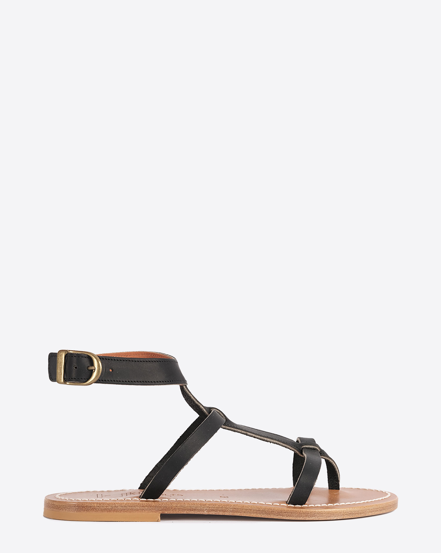 Sandales plates Artimon K.Jacques en cuir naturel noir. Vue profil. 
