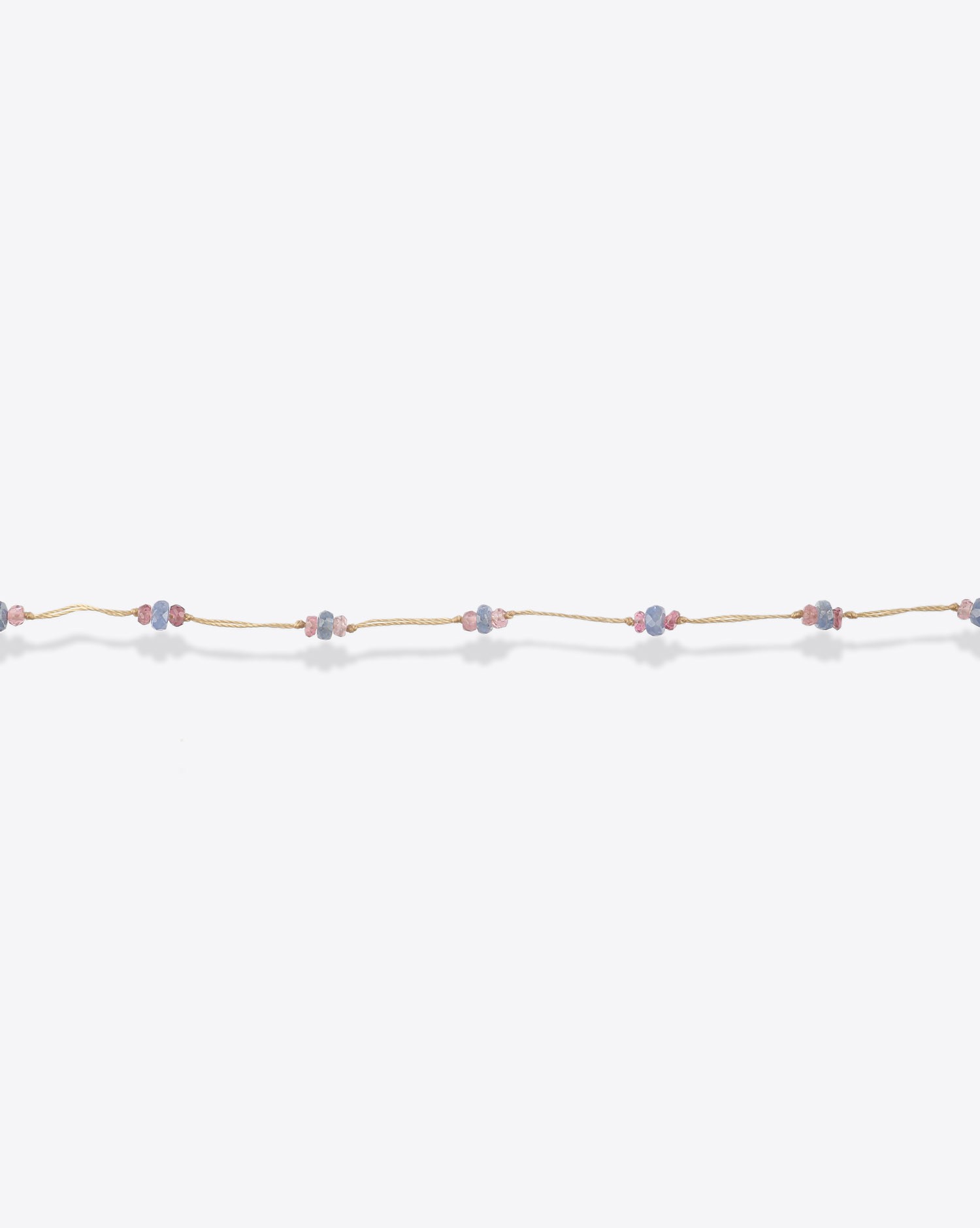 Produit Bracelet Saphir Sharing Cordon Beige avec perles. 
