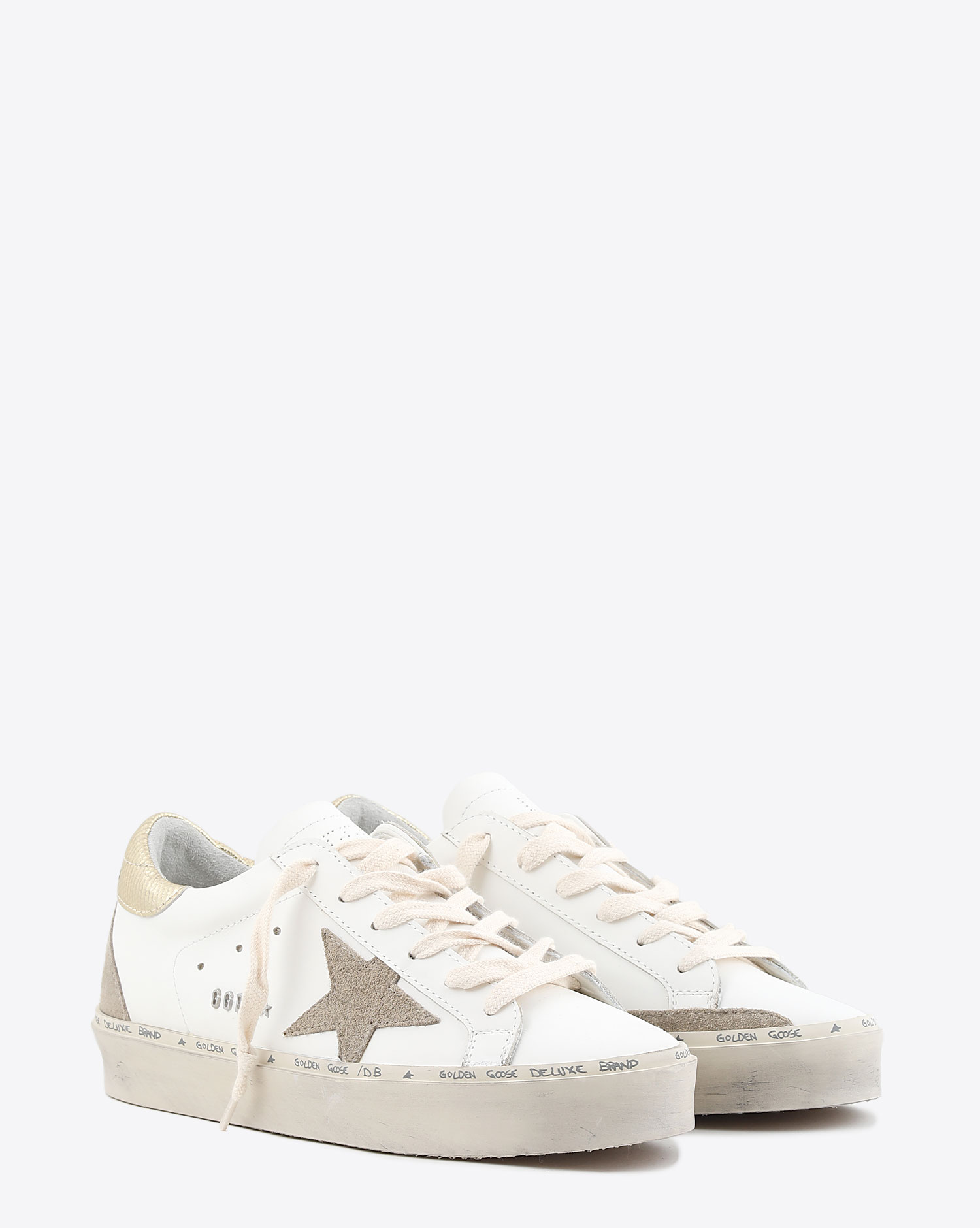 Sneakers compensées Hi Star en cuir blanc étoile daim beige arrière cuir doré 11185 Golden Goose femme. 