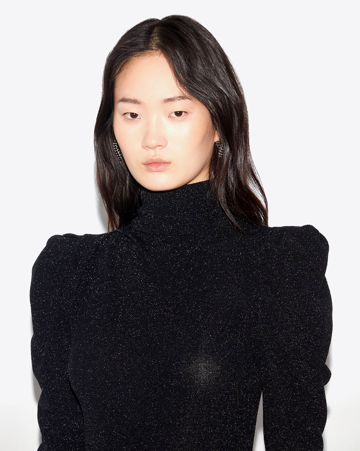 Top manches longues col montant épaulé en jersey Lurex noir Baiola Isabel Marant Etoile. Détail des épaules.