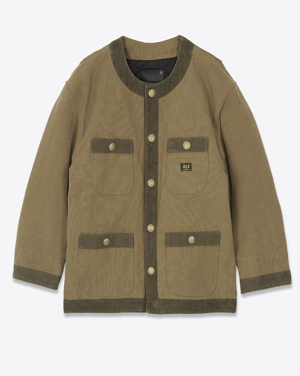 Produit Veste oversize matelassée Cord Trimmed Chore Jacket R13 en toile de coton marron bordée de velours côtelé kaki. Vue de face.