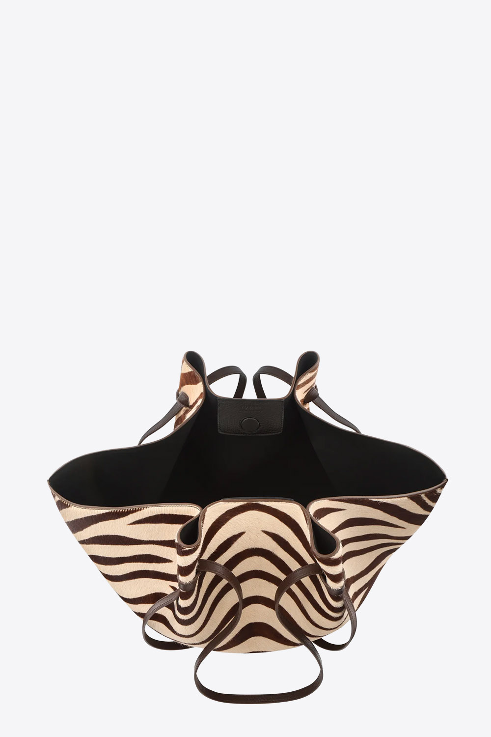Sac cabas Mochi Large Yuzefi en cuir pony Savanna imprimé zèbre marron et écru, grand sac porté épaule à la ligne structurée et au style contemporain. Détail de l'intérieur.
